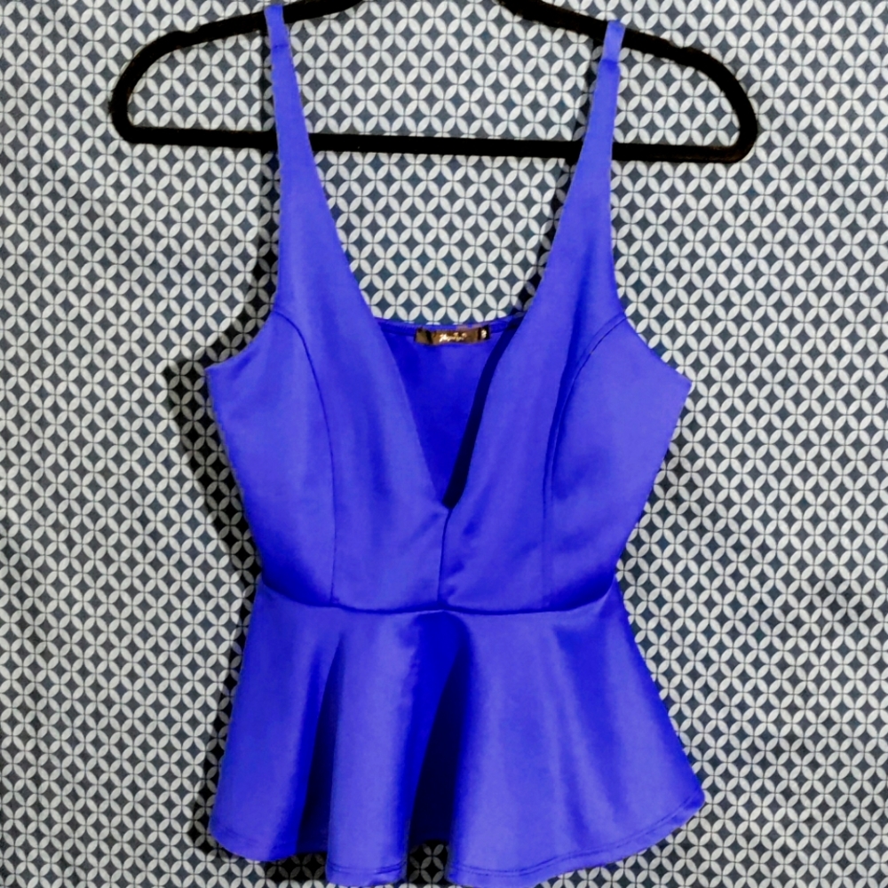 Papaya - Royal blue peplum top with deep V in front and flare bottom. Size- M